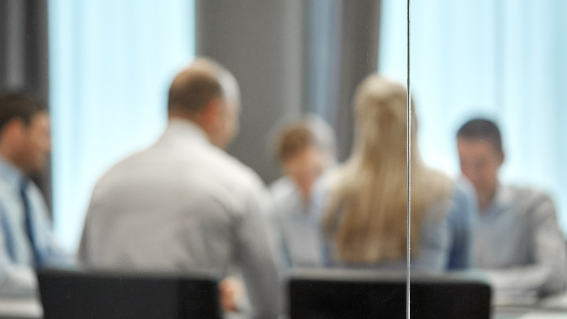 43202826 Business Team Meeting At Office Behind Glass Wall Besk