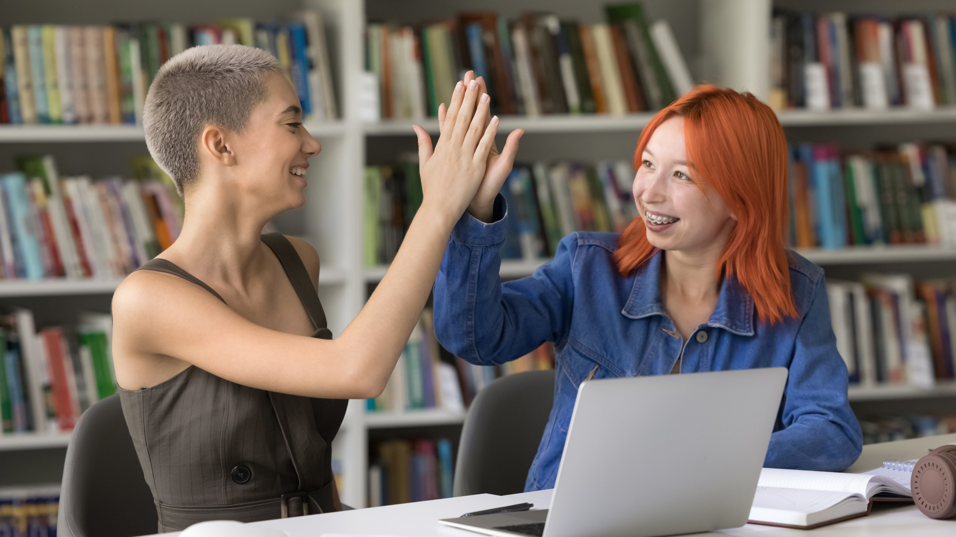 Mp64539375 Two Students Pretty Redhead And Blonde Girls Giving High (1)